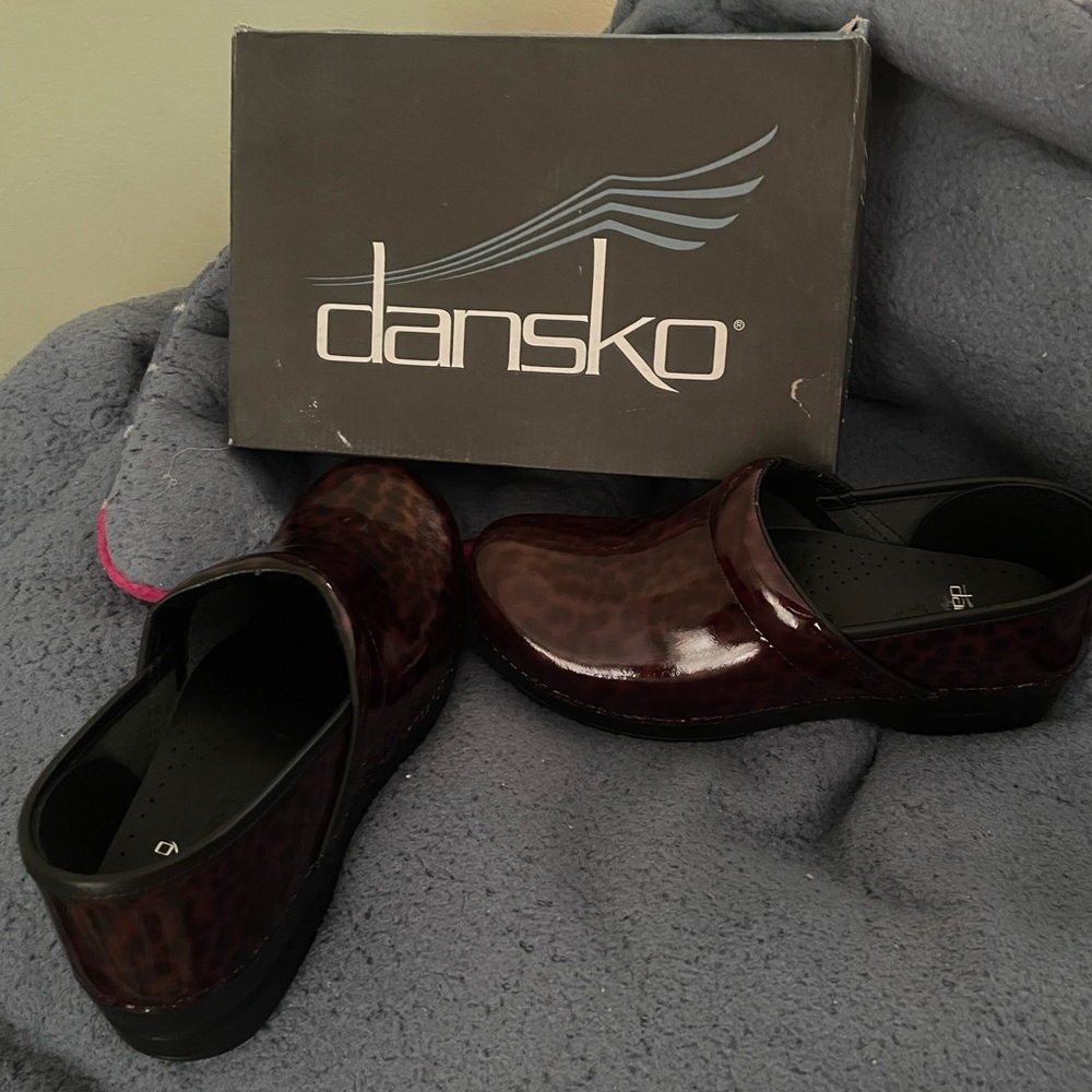 Brand new in the box. Never worn. Were always a bit tight on me. Normal width.